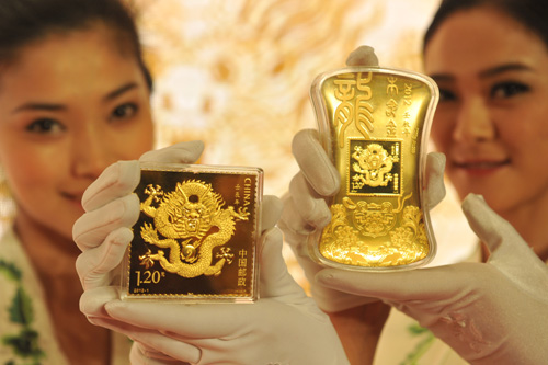 中国集邮总公司发行龙年邮票金砖集藏界掀起
