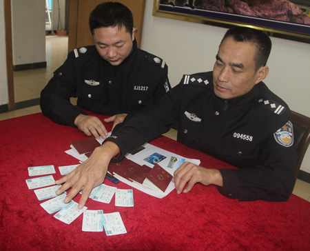 海南铁路警方端掉一倒票团伙收缴实名制火车票123张