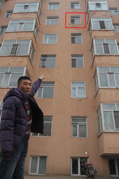 哈尔滨男子徒手接住5楼坠落110斤重少年（图）