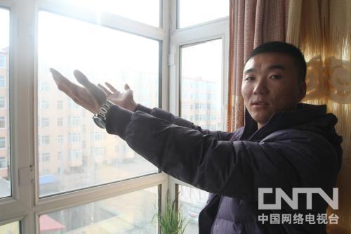 哈尔滨男子徒手接住5楼坠落110斤重少年（图）