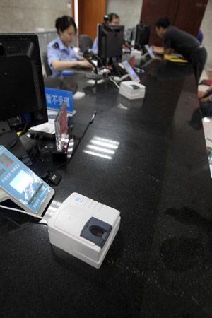 北京将启用电子护照 指纹签名录入芯片
