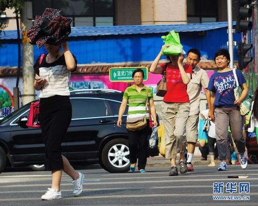 全国天气“水火两重天”