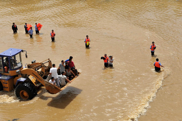 直击辽宁盖州突发洪水6万受灾群众有序撤离[1