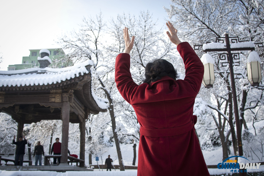 中国日报直击北京三月春雪