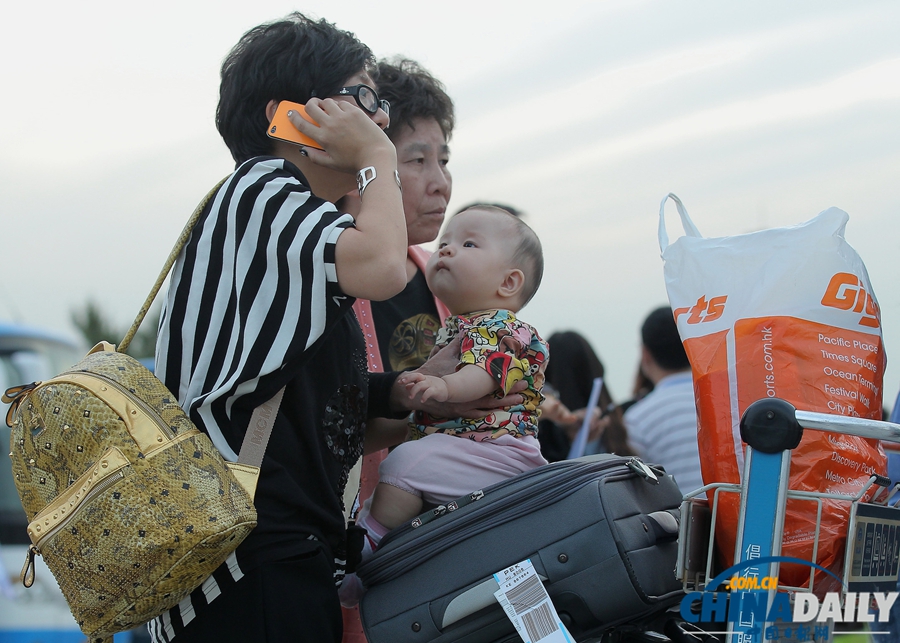 “海娜号”邮轮滞留韩国游客陆续抵达北京