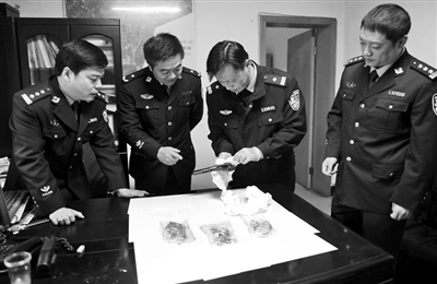 湖南娄底持枪抢劫金店案告破 两名蒙面抢劫疑犯被刑拘