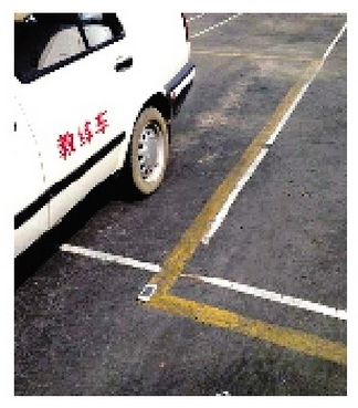 武汉驾校出“狠招”：手机当标杆 练倒车入库(图)