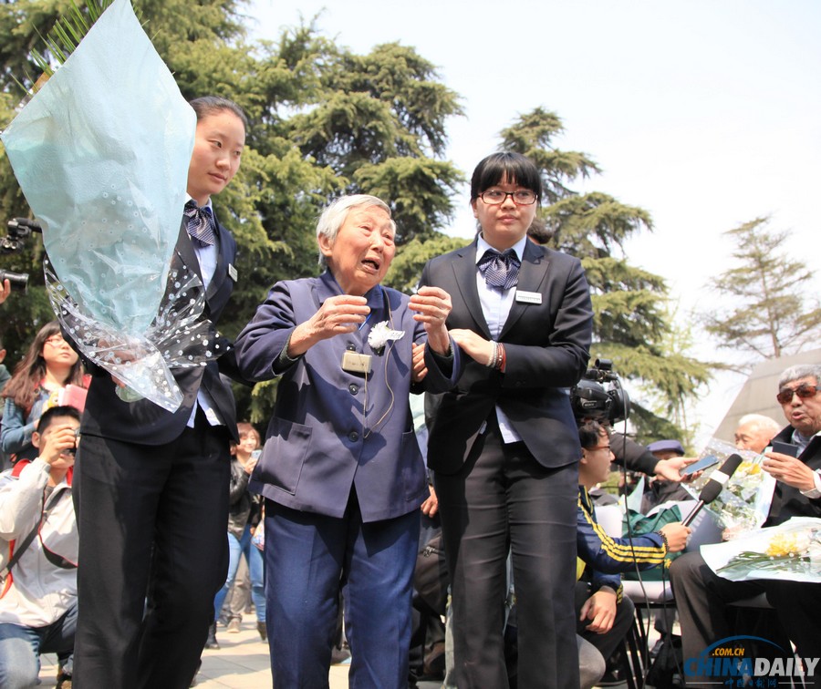 南京举办南京大屠杀死难者遗属2014年清明祭仪式