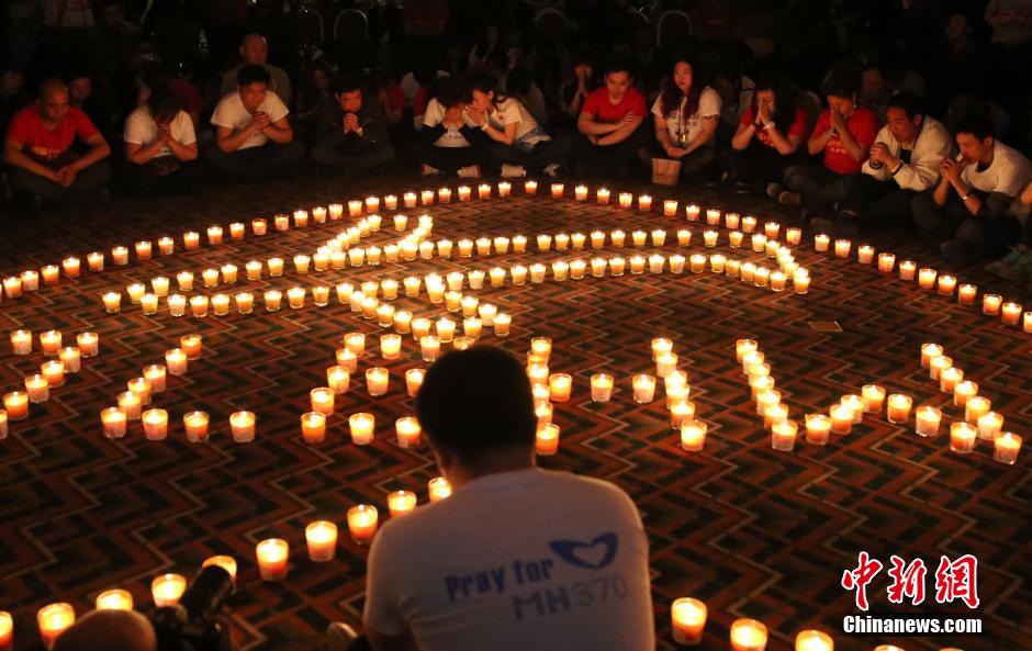 MH370航班失联满月 在京乘客家属举行祈福活动