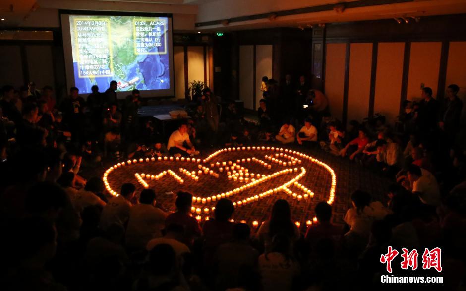 MH370航班失联满月 在京乘客家属举行祈福活动