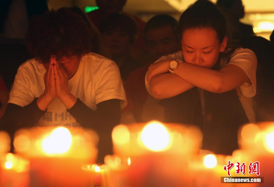 MH370航班失联满月 在京乘客家属举行祈福活动