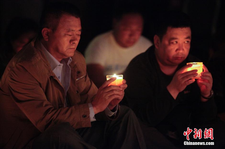 MH370航班失联满月 在京乘客家属举行祈福活动