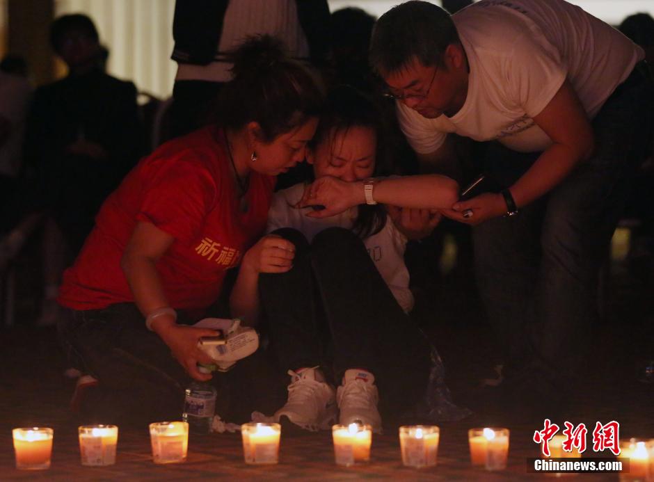 MH370航班失联满月 在京乘客家属举行祈福活动