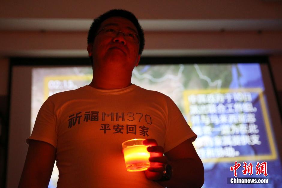 MH370航班失联满月 在京乘客家属举行祈福活动