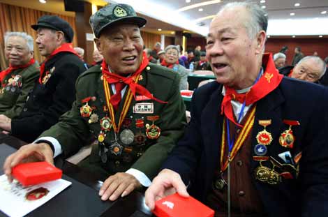 “永远铭记最可爱的人•纪念抗美援朝60周年”纪念邮票首发式及书画大展在北京举行