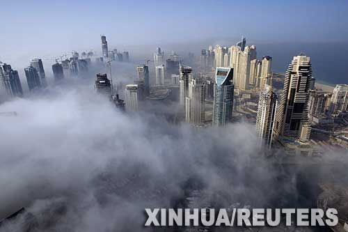 经济观察:迪拜债务违约引发三大争辩