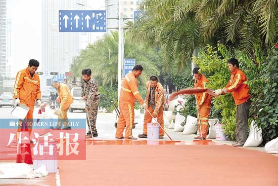 南宁开工铺设首条彩色公交专用道 近期投入使用