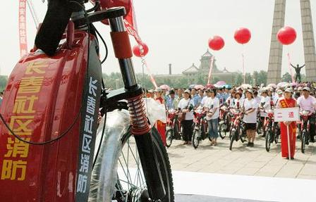 长春市政府为社区免费发放消防电动自行车