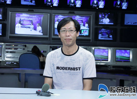 访谈实录:周江疆的大爱人生(组图)