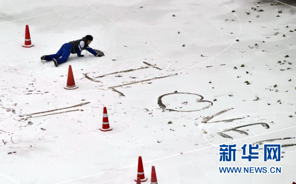 北京飘落今冬首场雪预计中午结束