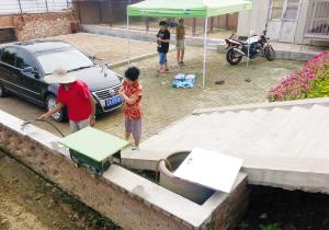 男子用高压水枪洗摩托 遭电击当场身亡(图)