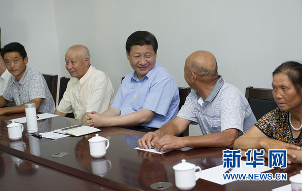 习近平：坚定不移全面深化改革开放 脚踏实地推动经济社会发展