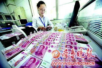 央行再降息 楼市是否迎转机专家意见不一