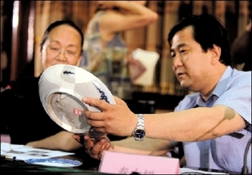 圆明园首批文物完成修复 图案无依据遭质疑