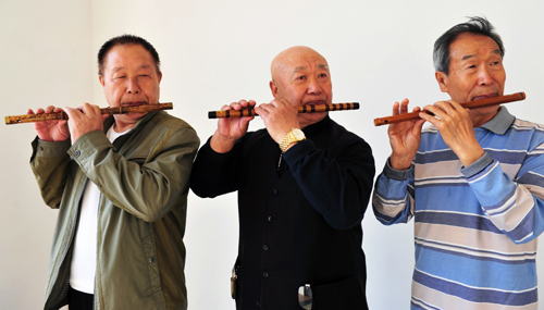 欢快笛声唤春天