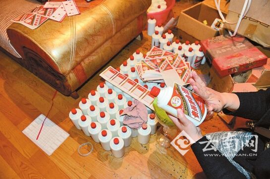 昆明警方查获一制假窝点 收缴600余瓶假名酒
