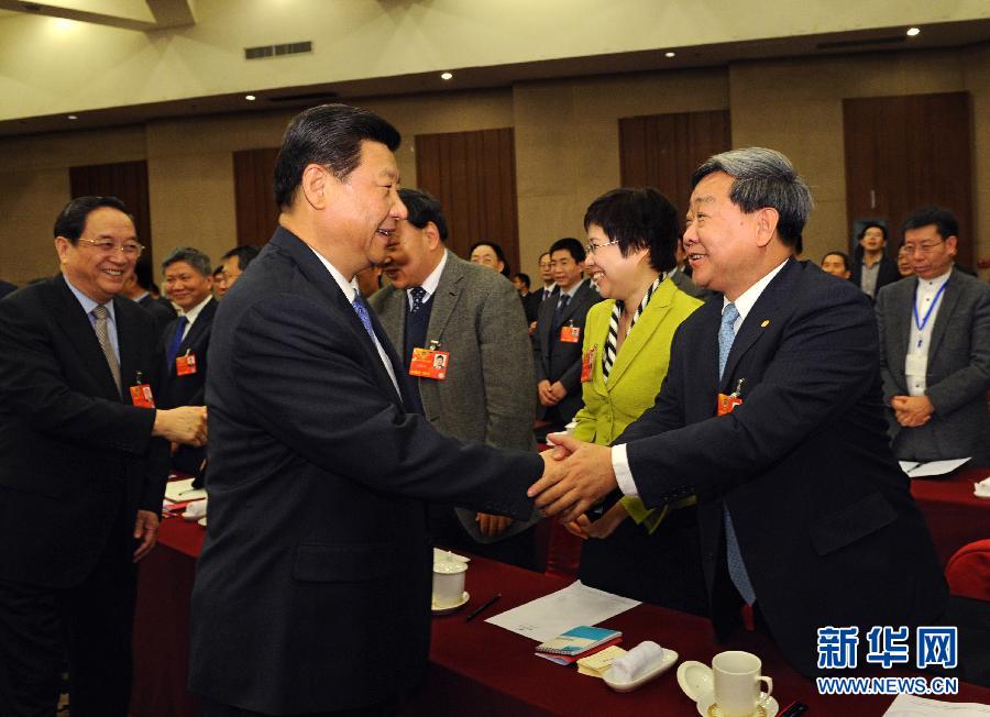 习近平看望政协科协科技界委员