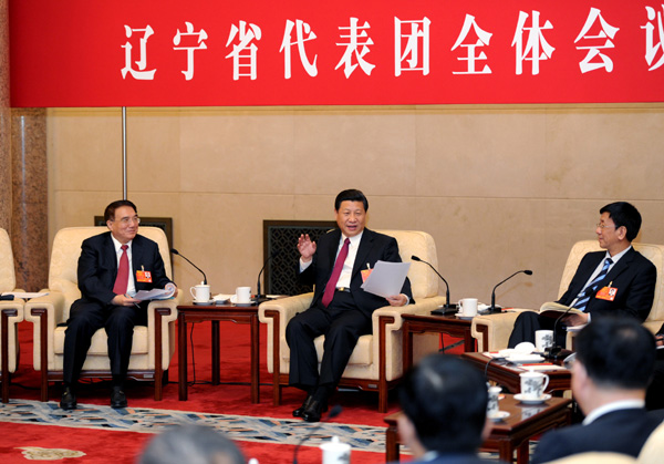 习近平:让群众得到看得见、摸得着的实惠