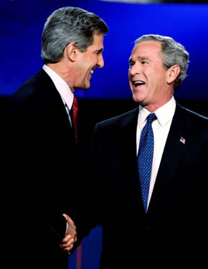 U.S. President George W. Bush makes a point during the first presidential debate with Democratic nominee John Kerry, at the University of Miami in Coral Gables, Florida September 30, 2004. The 90-minute, televised session will give voters their first chance to compare the candidates directly.