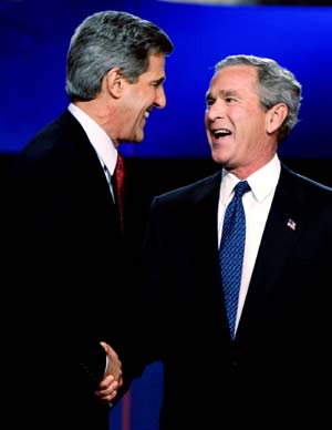 U.S. President George W. Bush makes a point during the first presidential debate with Democratic nominee John Kerry, at the University of Miami in Coral Gables, Florida September 30, 2004. The 90-minute, televised session will give voters their first chance to compare the candidates directly. 