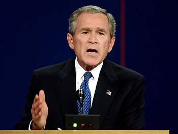 U.S. President George W. Bush makes a point during the first presidential debate with Democratic nominee John Kerry, at the University of Miami in Coral Gables, Florida September 30, 2004. The 90-minute, televised session will give voters their first chance to compare the candidates directly. 