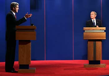 U.S. President George W. Bush makes a point during the first presidential debate with Democratic nominee John Kerry, at the University of Miami in Coral Gables, Florida September 30, 2004. The 90-minute, televised session will give voters their first chance to compare the candidates directly. 