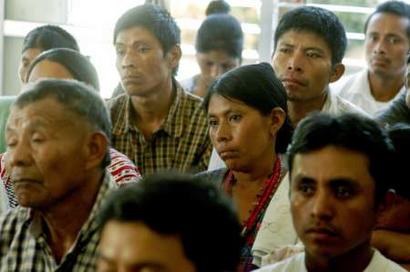 Witnesses of a 1982 massacre attend the trial of 6 ex-paramilitary fighters October 19, 2004 in Salama, Guatemala.[Reuters]