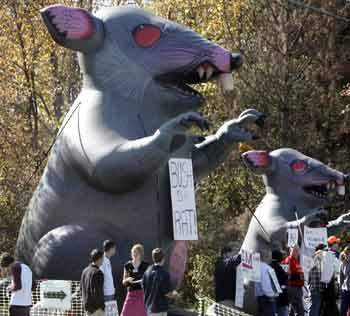 Protestors against U.S. President George W. Bush stage their demonstration outside a Bush campaign event in Westlake, Ohio, October 28, 2004. Bush is campaigning today in Pennsylvania, Ohio and Michigan during the final week of campaigning for the November 2 Presidential election. [Reuters]