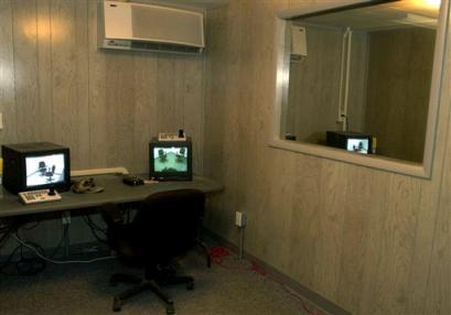 The monitoring room of an interrogation facility in Camp Delta at the Guantanamo Bay Naval Base, Cuba, is shown in this June 30, 2004 file photo. Allegations of abuse in Guantanamo, where 550 terror suspects have been held for nearly three years, surfaced after the scandal broke last year at the U.S.-run Abu Ghraib prison in Iraq. [AP]