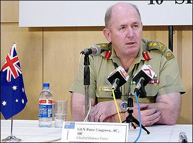 Picture taken of Australian defense force chief General Peter Cosgrove on 10 September 2004. Australia's military chief said an investigation was underway after a leading newspaper published a photo showing black recruits hounded in a Ku Klux Klan-style stunt. [AFP/file]