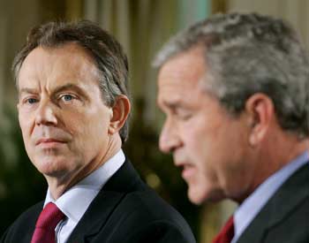 U.S. President George W. Bush (R) and British Prime Minister Tony Blair attend a press conference in the East Room of the White House in Washington November 12, 2004. The joint press conference gave Bush his first opportunity to speak at length in public about his plans for Middle East diplomacy since the death of Yasser Arafat, the veteran Palestinian leader. [Reuters]