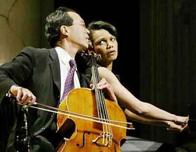 Condoleezza Rice accompanies cellist Yo-Yo Ma on the piano during the 