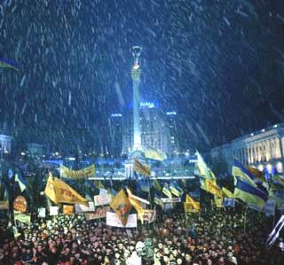 Supporters of opposition presidential candidate Viktor Yushchenko hold a massive rally in downtown Kiev, Sunday, Nov. 28, 2004. Yushchenko, who claims he was cheated out of victory in the Nov. 21 run-off election, is demanding a new vote. Hundreds of thousands of demonstrators have jammed downtown Kiev for a week to support him.