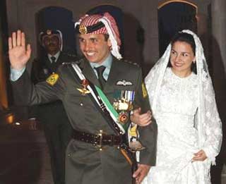 Jordan's Crown Prince Hamzeh and his wife Princess Noor, arrive at Zahran Palace where they celebrate their wedding ceremony in Amman, Jordan, in this May 27, 2004, file photo. Jordan's King Abdullah II stripped his half-brother and heir apparent of his title as crown prince on Sunday Nov. 28, 2004, in another major succession switch in the Hashemite dynasty that rules Jordan. King Abdullah II had named Hamzah crown prince hours after their father died of cancer on Feb. 7, 1999.[AP]