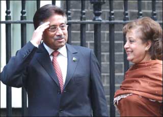 British police were probing why a top secret file detailing security arrangements for the visit of Pakistani President Pervez Musharraf, pictured arriving with his wife Sehba at Number 10 Downing Street, was found abandoned on a London street(AFP