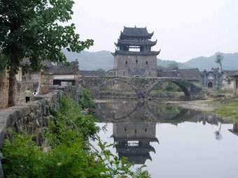 The 16-metre-tall wooden building Wenchangge (House of the Learned) is a landmark at the entrance of Shanggantang Village in Central China's Hunan Province.