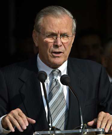US Defense Secretary Donald Rumsfeld will now personally sign letters of condolence to families of troops killed in action, after the Pentagon acknowledged signing machines had been used in the past. Rumsfeld gestures during a news conference in New Delhi, December 9, 2004. [Reuters/file]