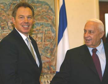 British Prime Minister Tony Blair meets Israeli Prime Minister in Jerusalem December 22, 2004. British Prime Minister Tony Blair meets Israeli and Palestinian leaders on Wednesday, raising the level of international efforts to revive Middle East peacemaking following Yasser Arafat's death. [Reuters]