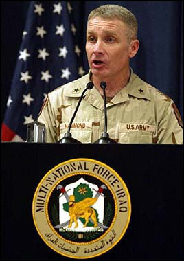 US Brigadier General Jeffery Hammond of the 1st Cavalry Division, gives a press conference in Baghdad. Hammond said there would be 5,000 extra troops deployed in Baghdad for the upcoming elections. [AFP]