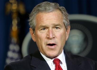 US President Bush makes a statement from his Crawford, Texas ranch, Wednesday, Dec. 29, 2004. Bush said Wednesday the United States, India, Australia and Japan have formed an international coalition to coordinate worldwide relief and reconstruction efforts for the Asian region ravaged by a deadly earthquake and tsunamis. [AP]